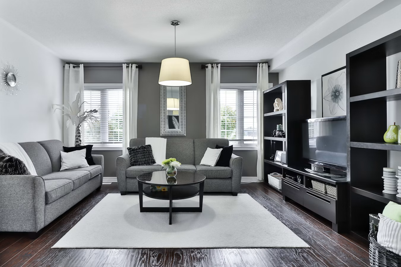 A living room with two couches and a coffee table