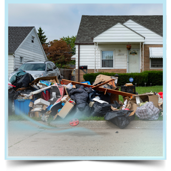 Junk pile outside the house