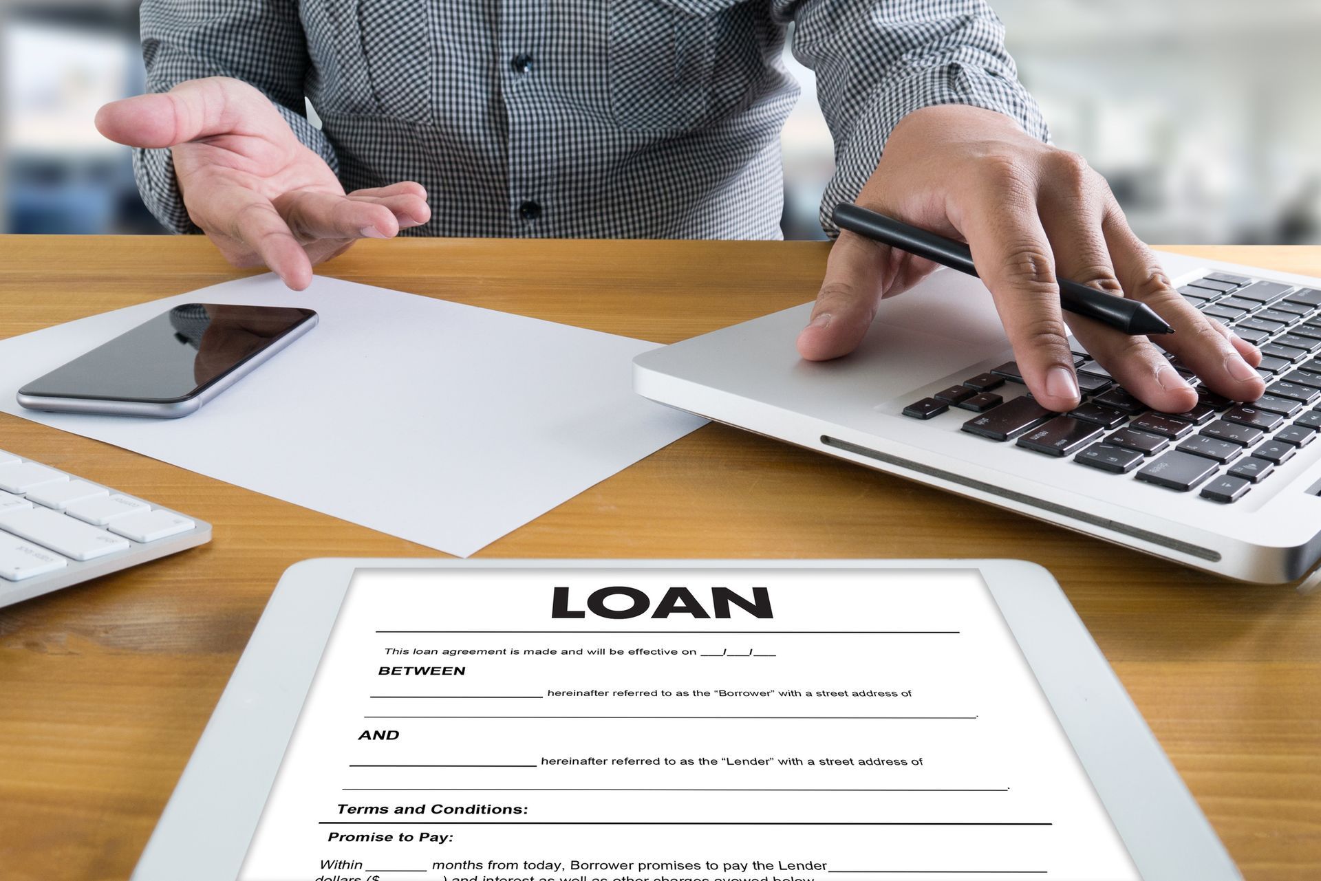 Document signing scene for personal installment loan approval and financial assistance.