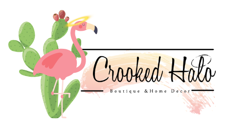 A logo for a boutique and home decor company with a flamingo and cactus.