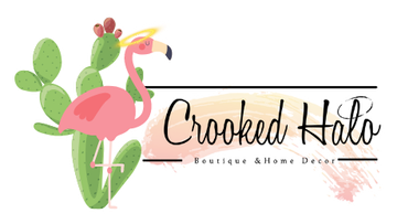 A logo for a boutique and home decor company with a flamingo and cactus.