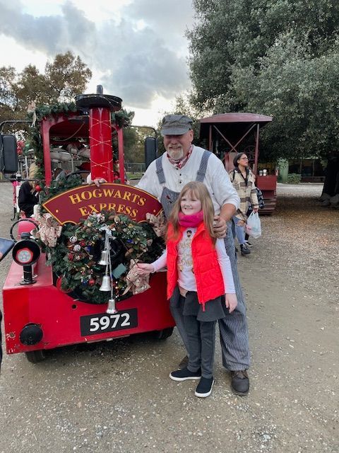 Train Engineer with Red Train | Stockton, CA - Butterfly-Express
