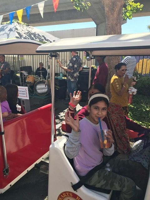 People Riding the Red Train | Stockton, CA - Butterfly-Express
