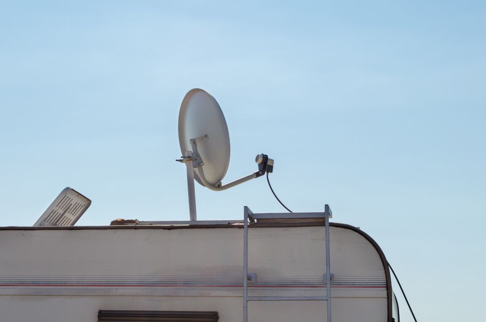 A Satellite Dish is Mounted on the Roof of a Trailer — Hendo's TV Antennas & Installations in White Rock, QLD