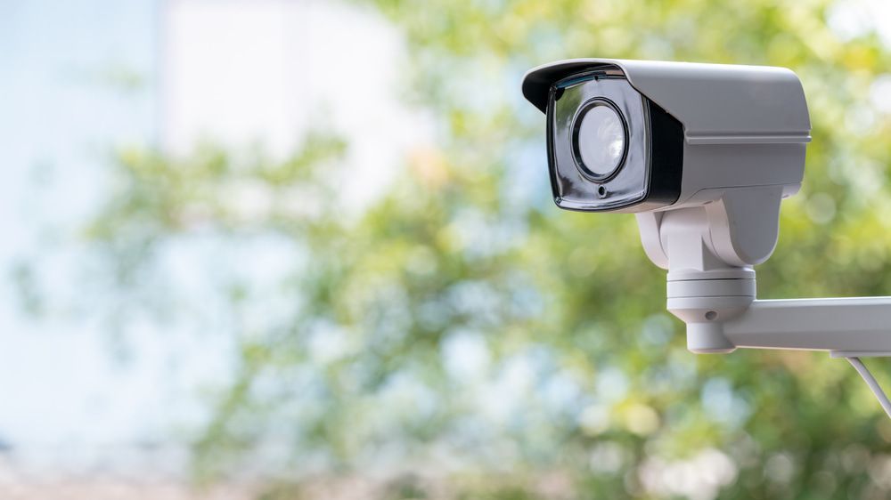 A Close Up of a Security Camera With Trees in the Background — Hendo's TV Antennas & Installations in Tablelands, QLD