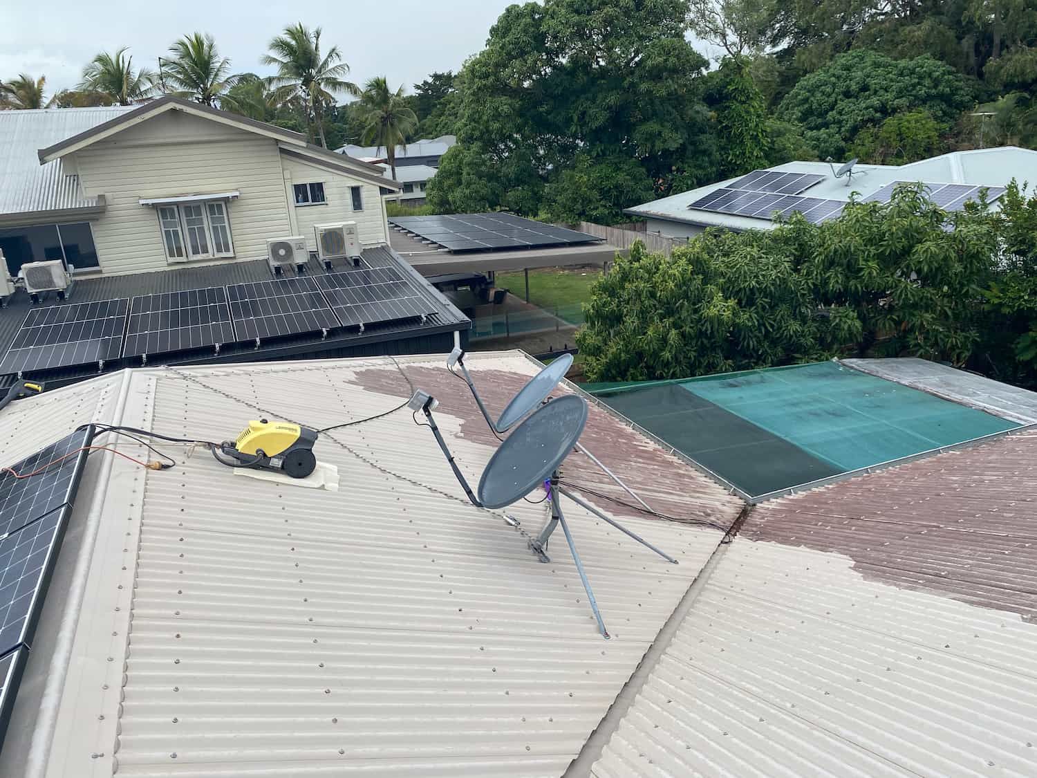 A Satellite Dish is Sitting on the Roof of a House — Hendo's TV Antennas & Installations in White Rock, QLD