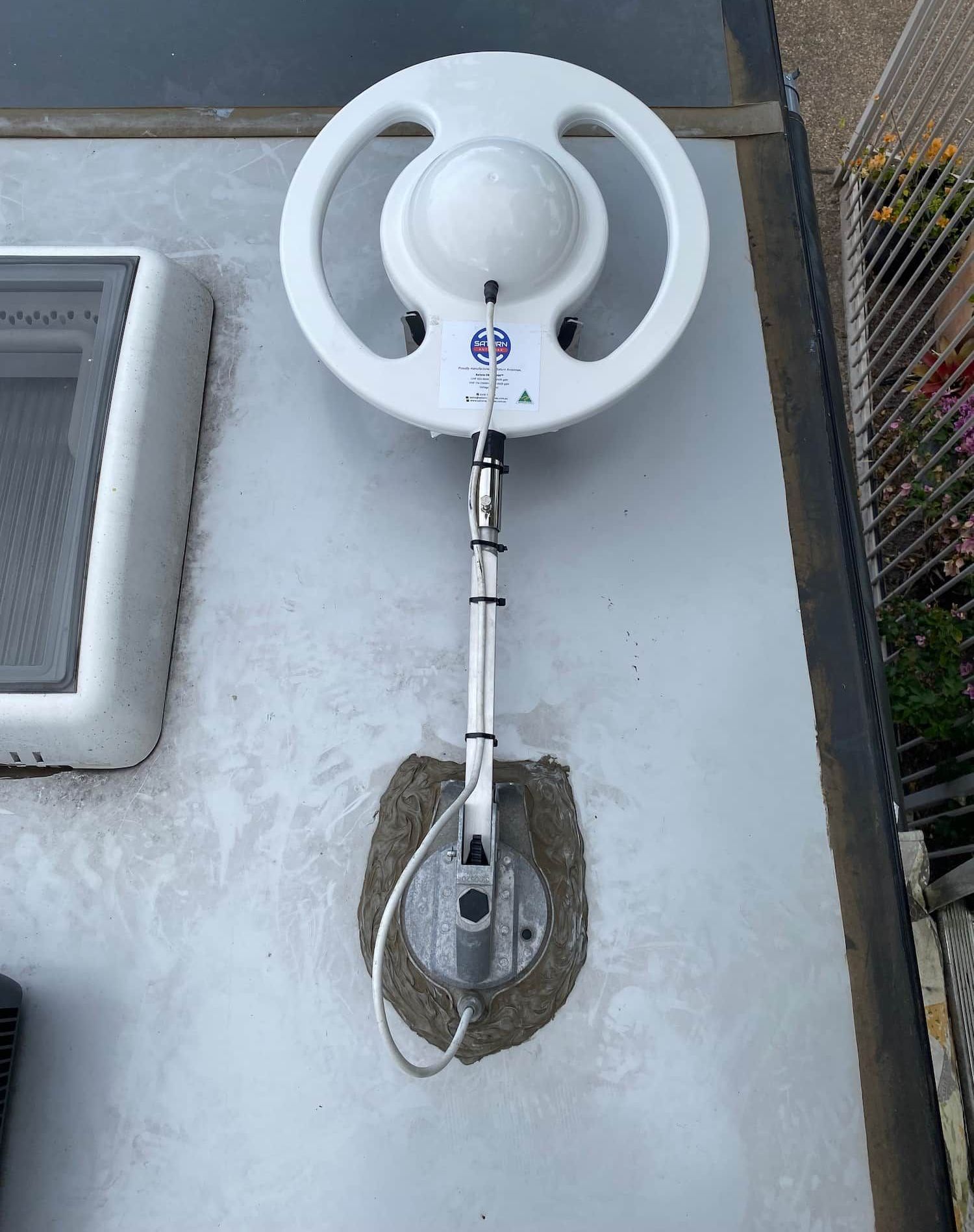 A White Antenna is Attached to the Side of a Building — Hendo's TV Antennas & Installations in White Rock, QLD