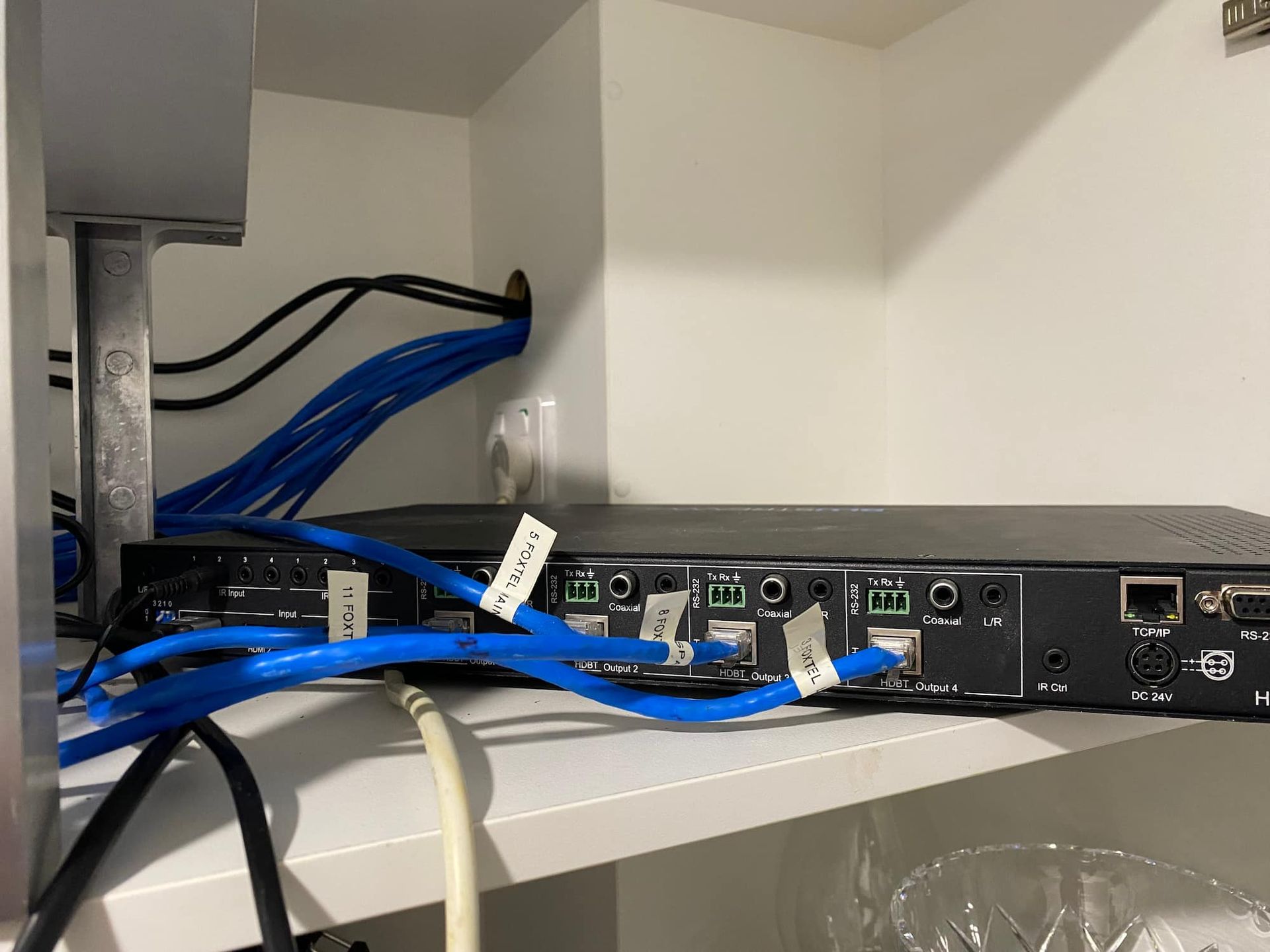 The Back of a Computer With Blue Wires Coming Out of It — Hendo's TV Antennas & Installations in Mission Beach, QLD