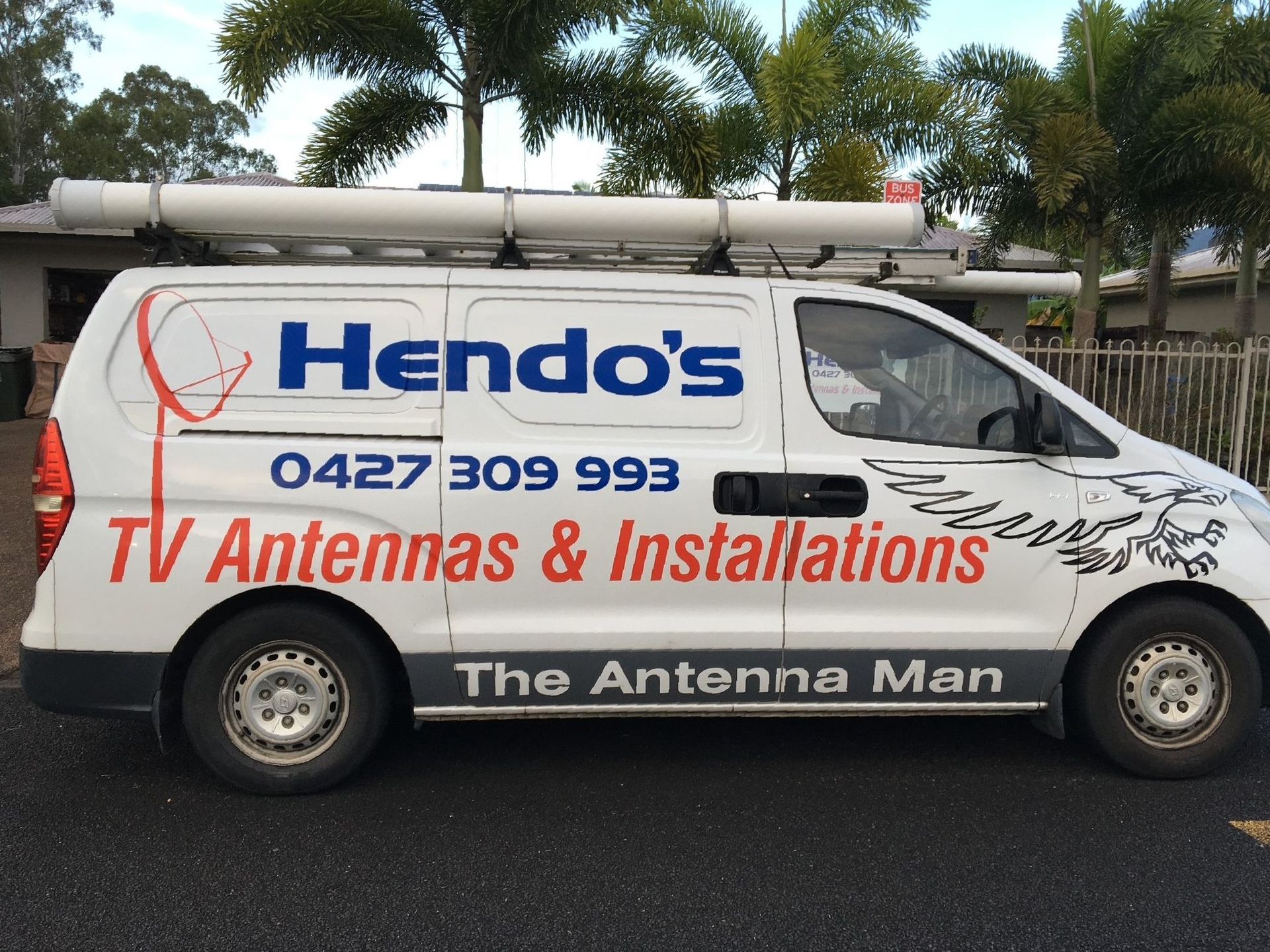 A White Rv With a Solar Panel on Top of It — Hendo's TV Antennas & Installations in White Rock, QLD