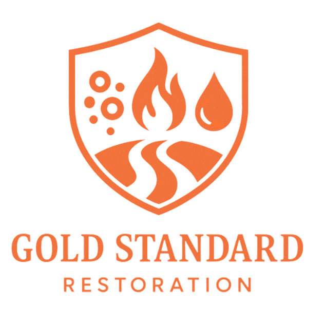 Gold Standard Restoration logo: Orange shield with fire, water, bubbles, and a winding path; text below.