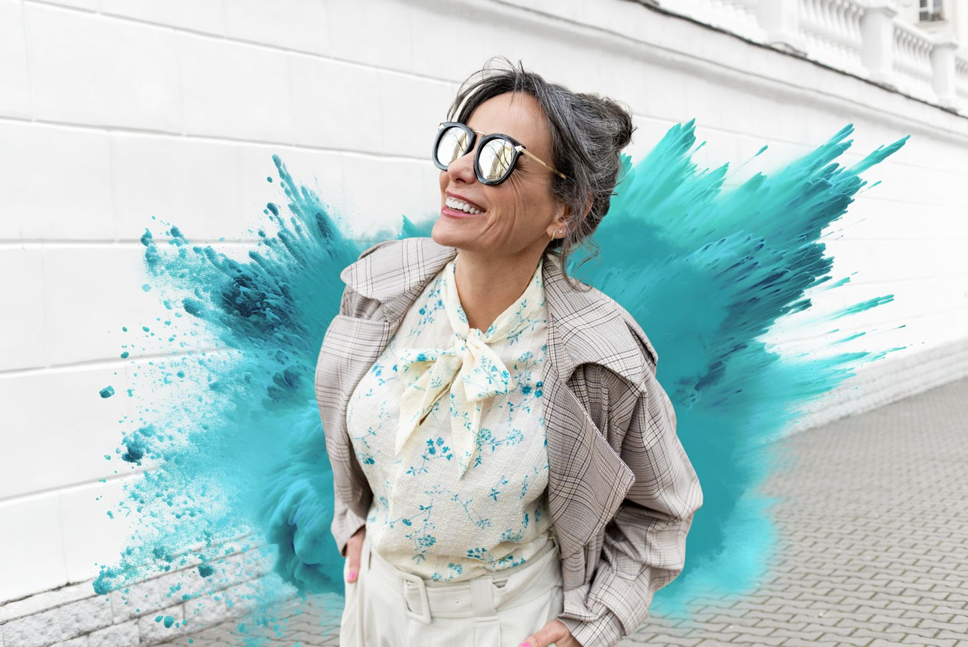 A man is standing in front of a rack of bread in a bakery.