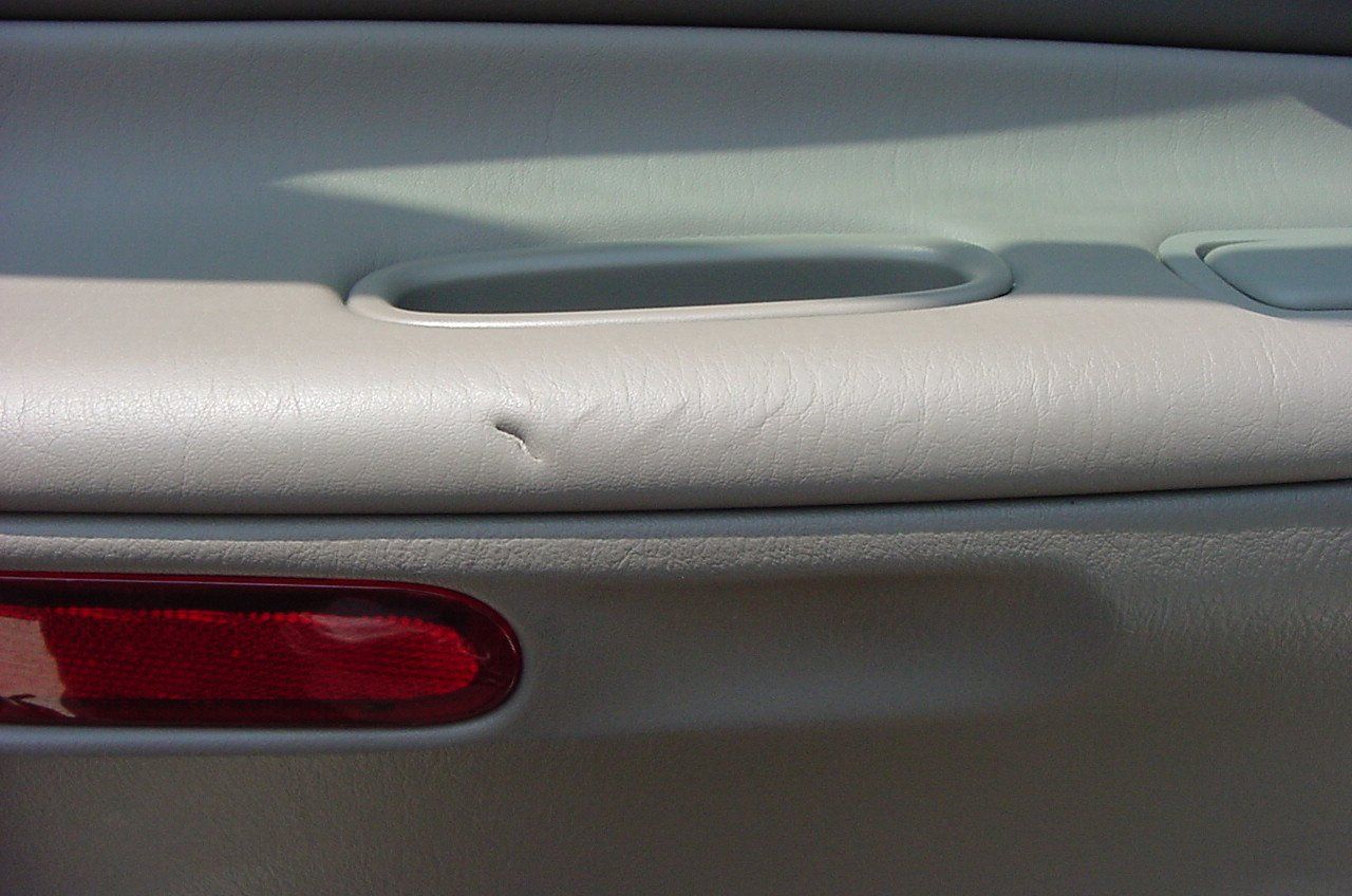 Car Door with Dent — Kalamazoo, MI — Auto Trim Group