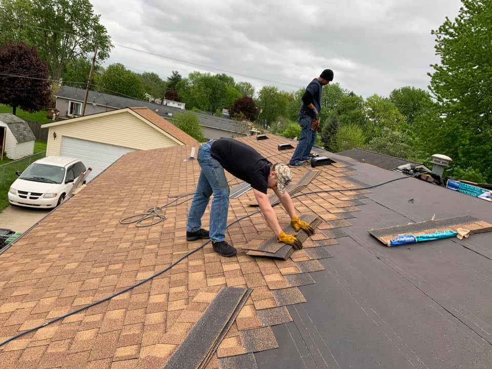 Two Men Repairing House Roofing — Redford, MI — Bill's Home Maintenance