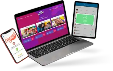 A laptop , tablet , and phone are sitting next to each other on a table.