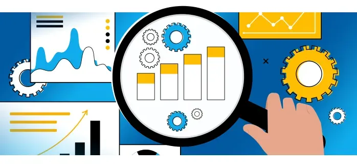 A hand is holding a magnifying glass over a graph.