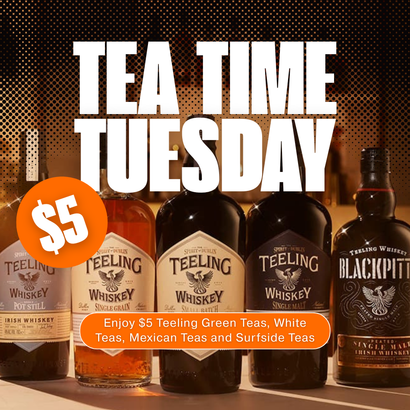 Bottles of Teeling Whiskey are lined up on a table
