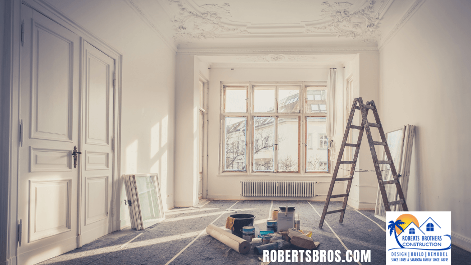 Room with ladder and paint on ground — Sarasota, FL — Roberts Brothers Construction
