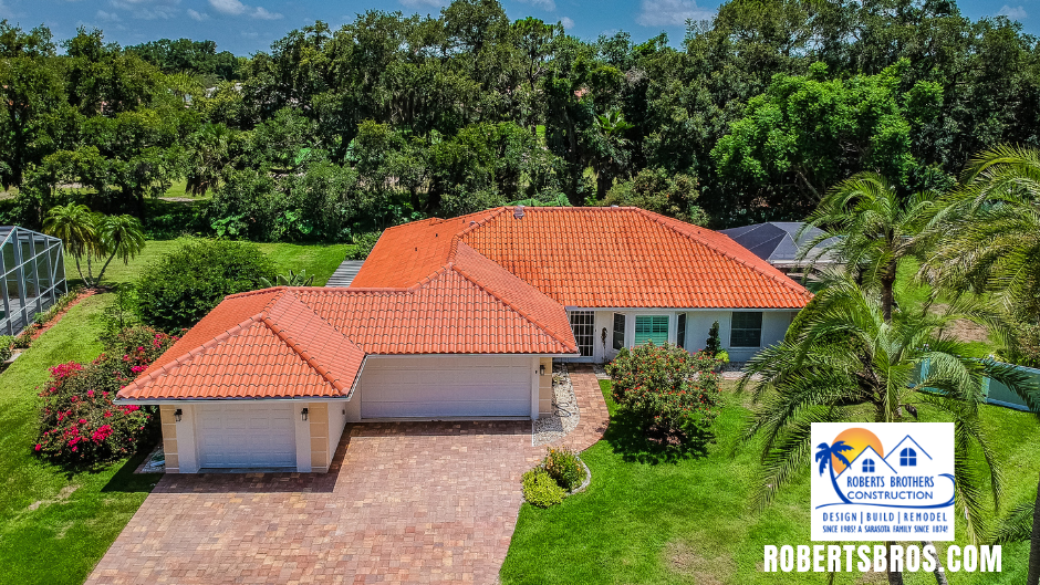 Wide house with red orange roof — Sarasota, FL — Roberts Brothers Construction