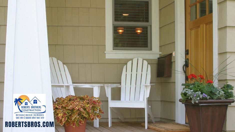 Two white chairs on patio — Sarasota, FL — Roberts Brothers Construction