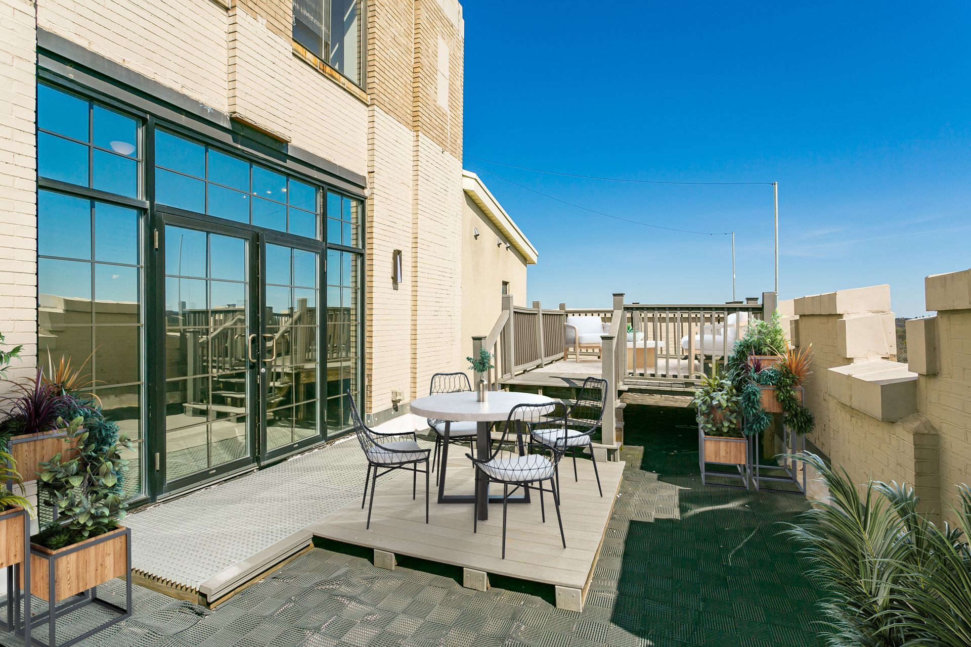 Medical Arts Building Apartment Rooftop with Views of Downtown Rochester Skyline