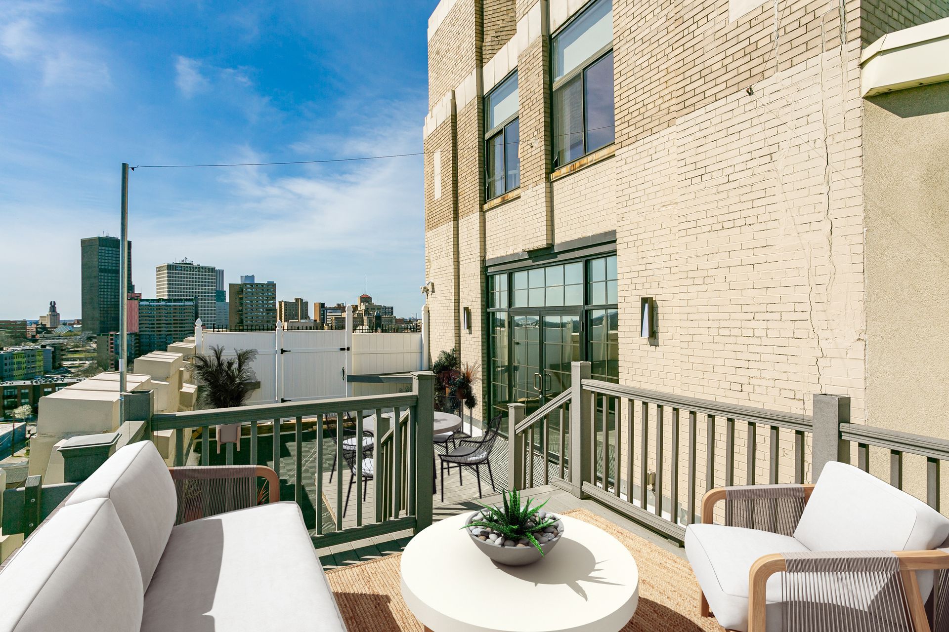 Medical Arts Building Apartment Rooftop with Views of Downtown Rochester Skyline