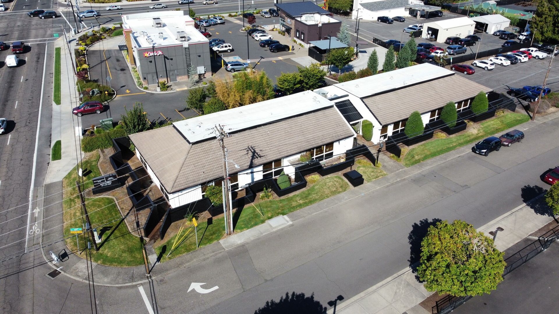 An aerial view of a residential area with a lot of buildings