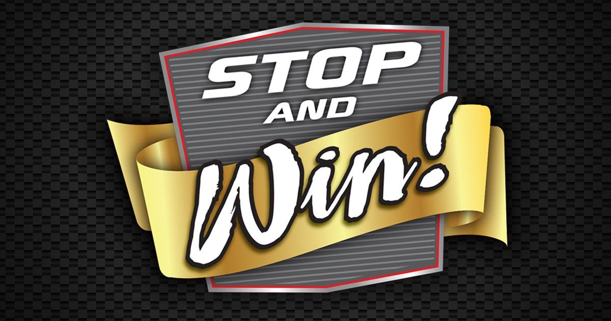 A stop and win sign with a gold ribbon on a black background.