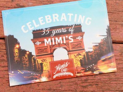 A postcard celebrating 35 years of mimi 's cafe