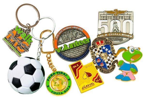 photo of various key tags and lapel pins