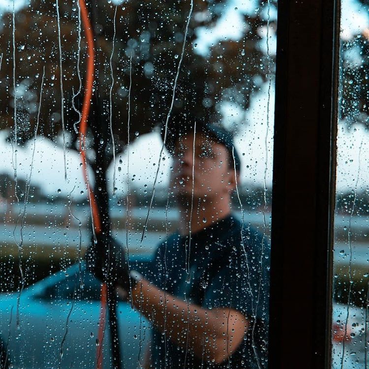 Cleaning Window Using Brush