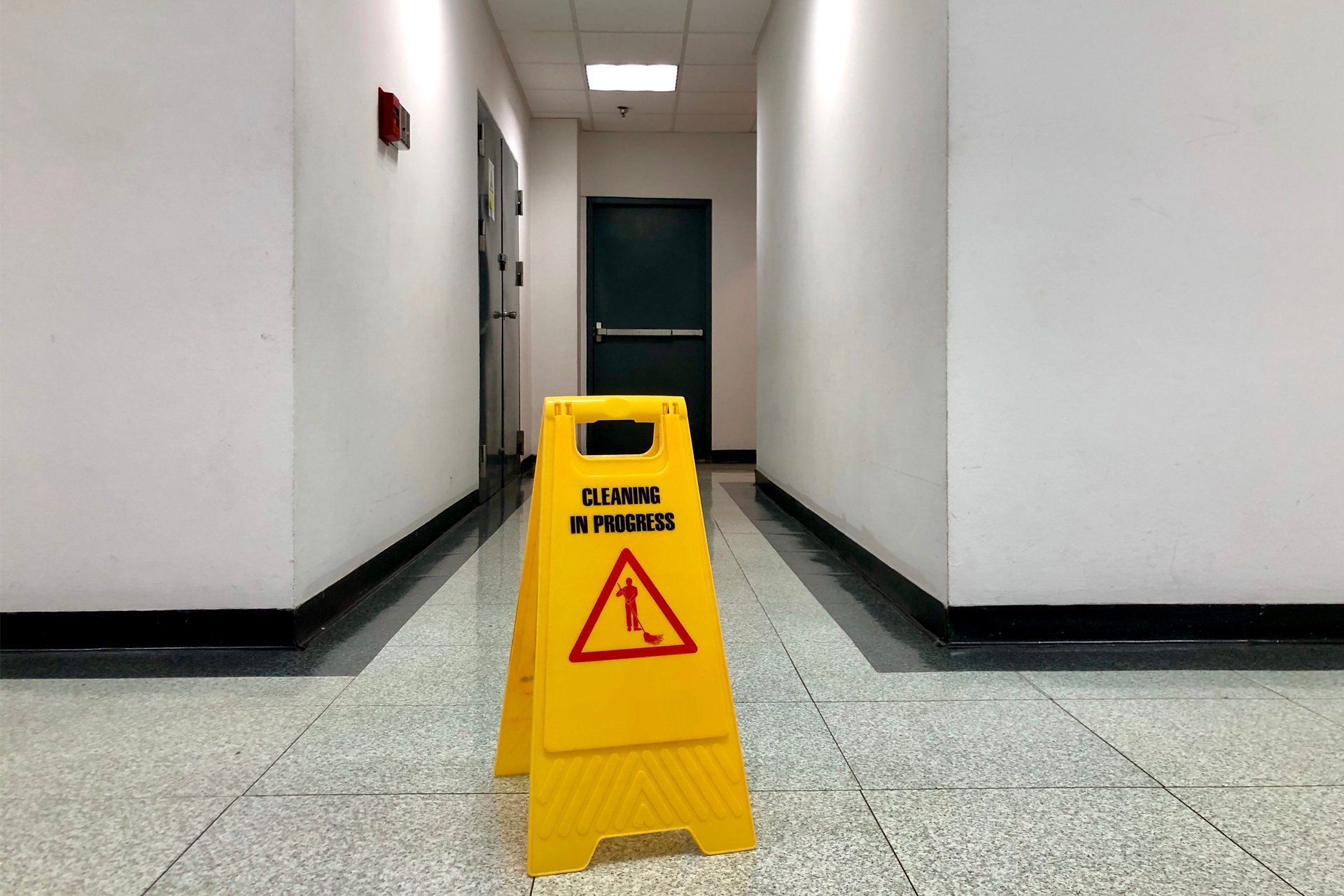 Cleaning Sign Outside The Toilet