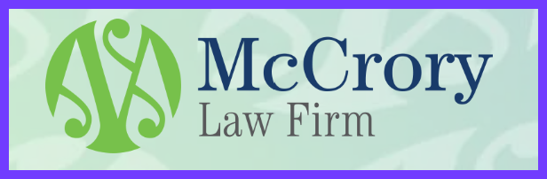 The logo for mccrory law firm is green and blue