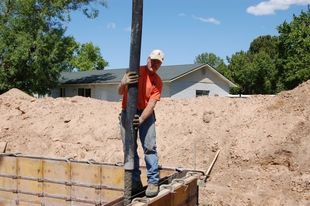 Concrete Company — Man Working On The Foundation in Northern Utah, UT