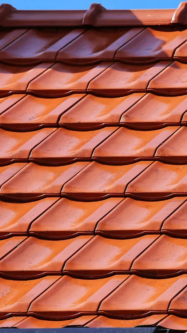 Indicatieve kosten voor een nieuw dak geplaatst door DAA Dakwerken in Aalst, afhankelijk van materiaal en oppervlakte