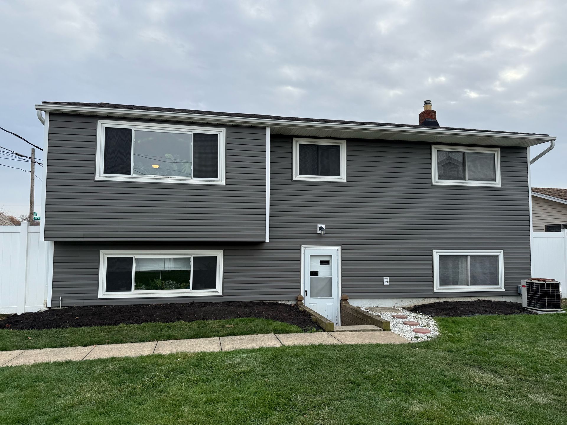 Front House with Blue Siding — Kent, OH — ARC Contracting of Ohio LLC