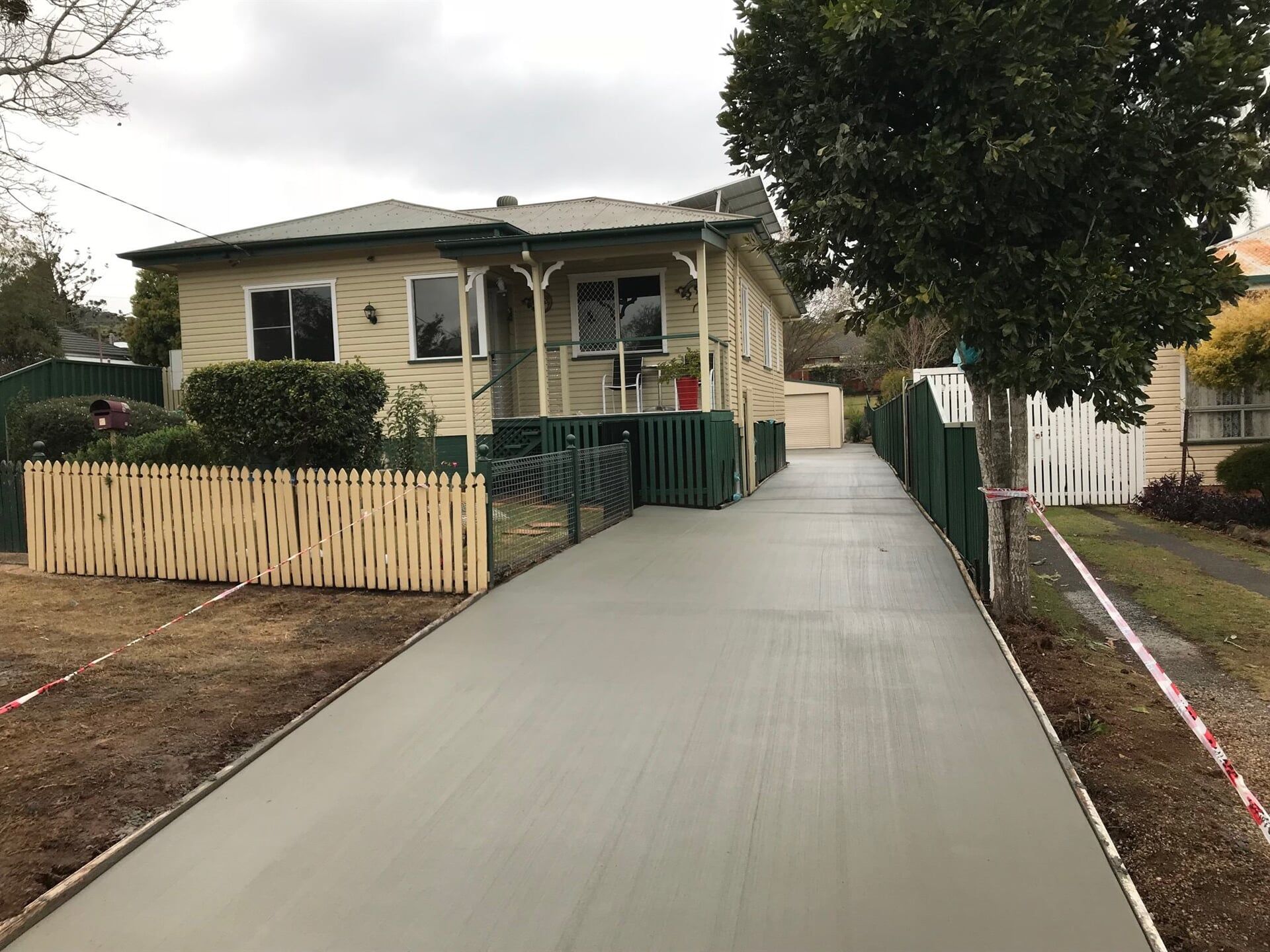 A freshly poured concrete driveway in rural South East Queensland