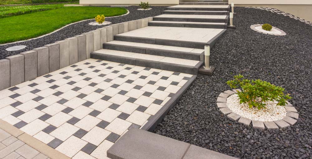 Garden With Decorative Concrete As Pathway — McCoy Concreting in Westbrook, QLD