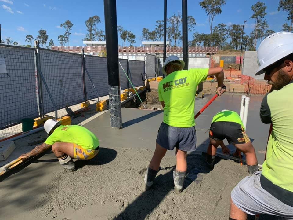 A team of concreters in Toowoomba pouring a driveway
