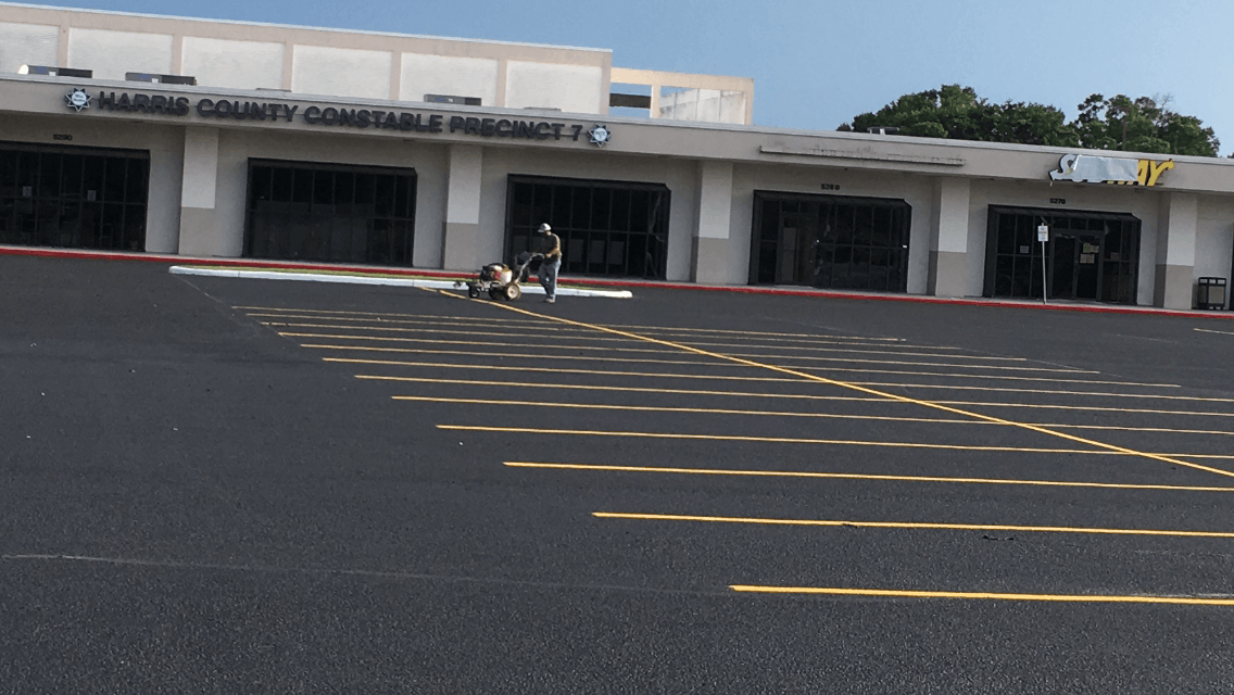Yellow Stripe On Parking Lot — Houston, TX — HEV Asphalt Paving Co.