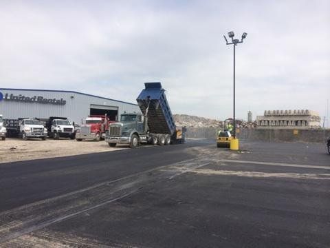 Laying Asphalt On Warehouse Driveway — Houston, TX — HEV Asphalt Paving Co.
