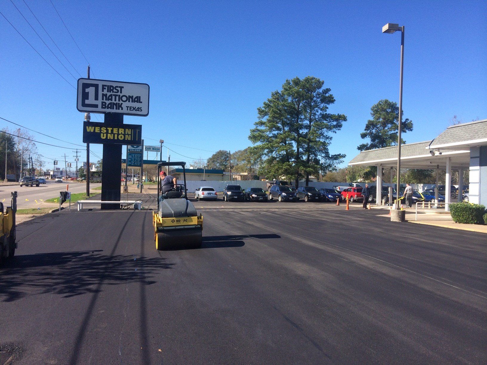 Paving The Parking Lot Of A Bank — Houston, TX — HEV Asphalt Paving Co.