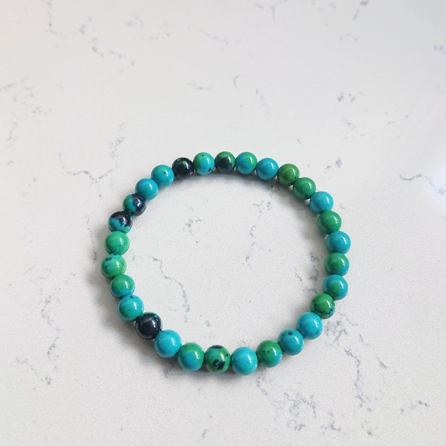 armband van chrysocolla kralen met een mooi maar ook stoere look door de groen/blauwe tinten van de kralen