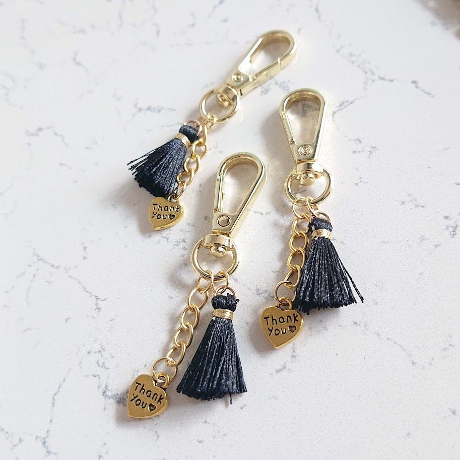 Sleutelhanger 'thank you' met zwart kwastje van Stainless Steel