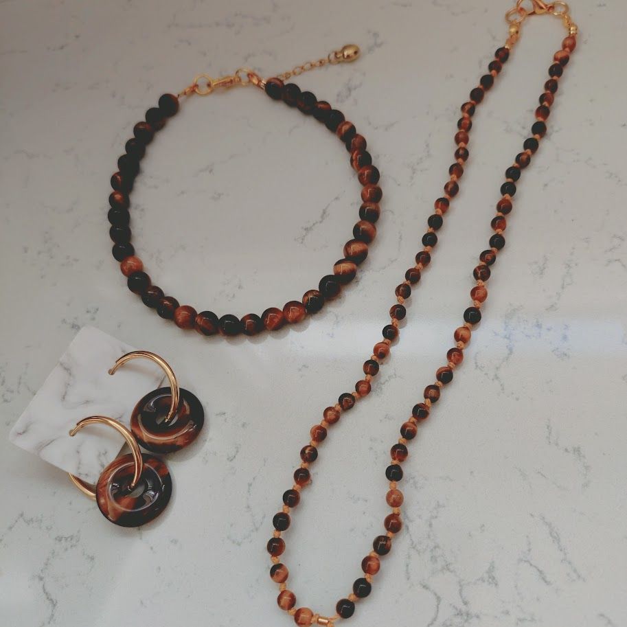 geknoopte ketting met sluiting van gouden stainless steel