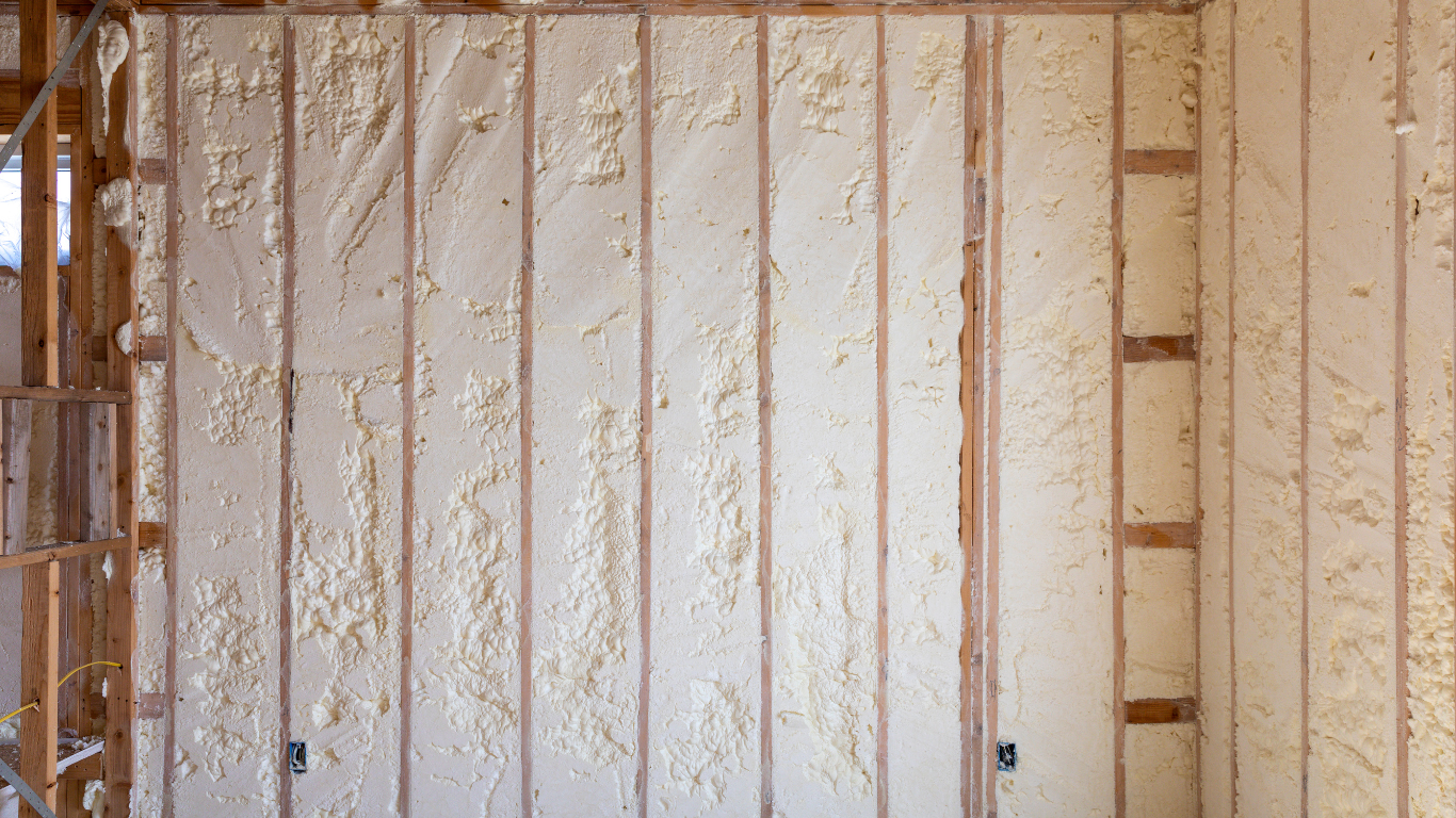 Wall cavities expertly filled with spray foam insulation, showcasing a clean and uniform application for maximum energy efficiency and airtight sealing in County Limerick.