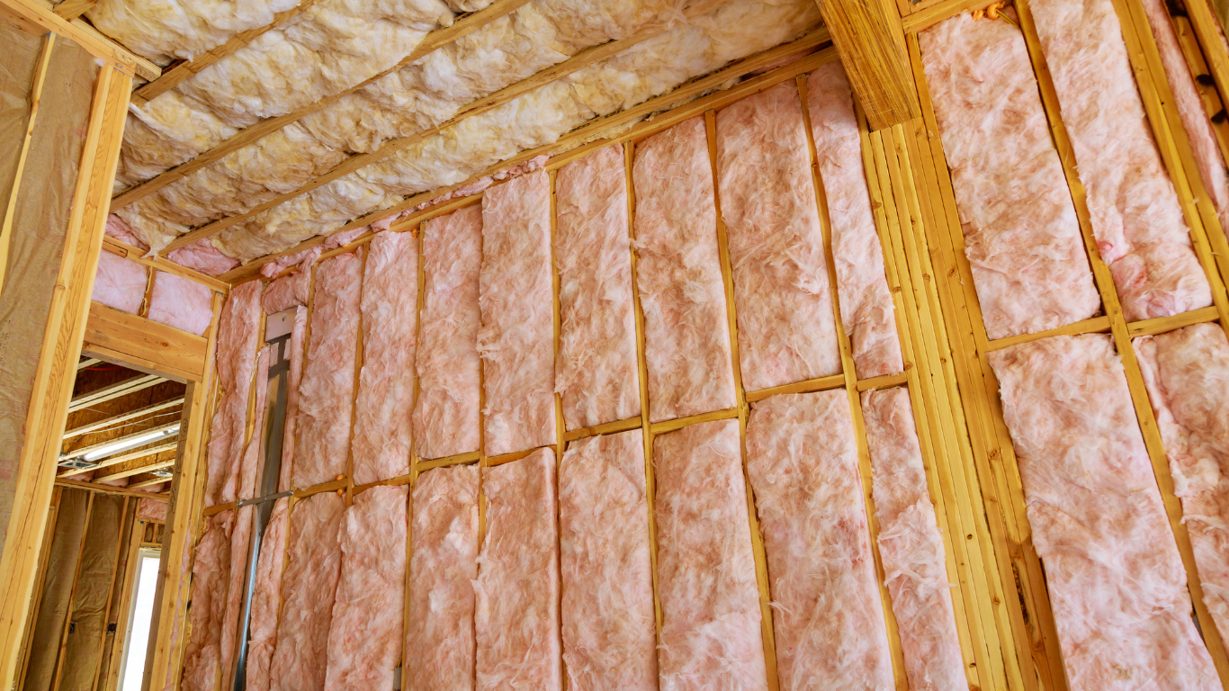 Fibreglass insulation installed in wall cavities, enhancing thermal efficiency and reducing heat loss for a comfortable, energy-saving home in County Limerick.