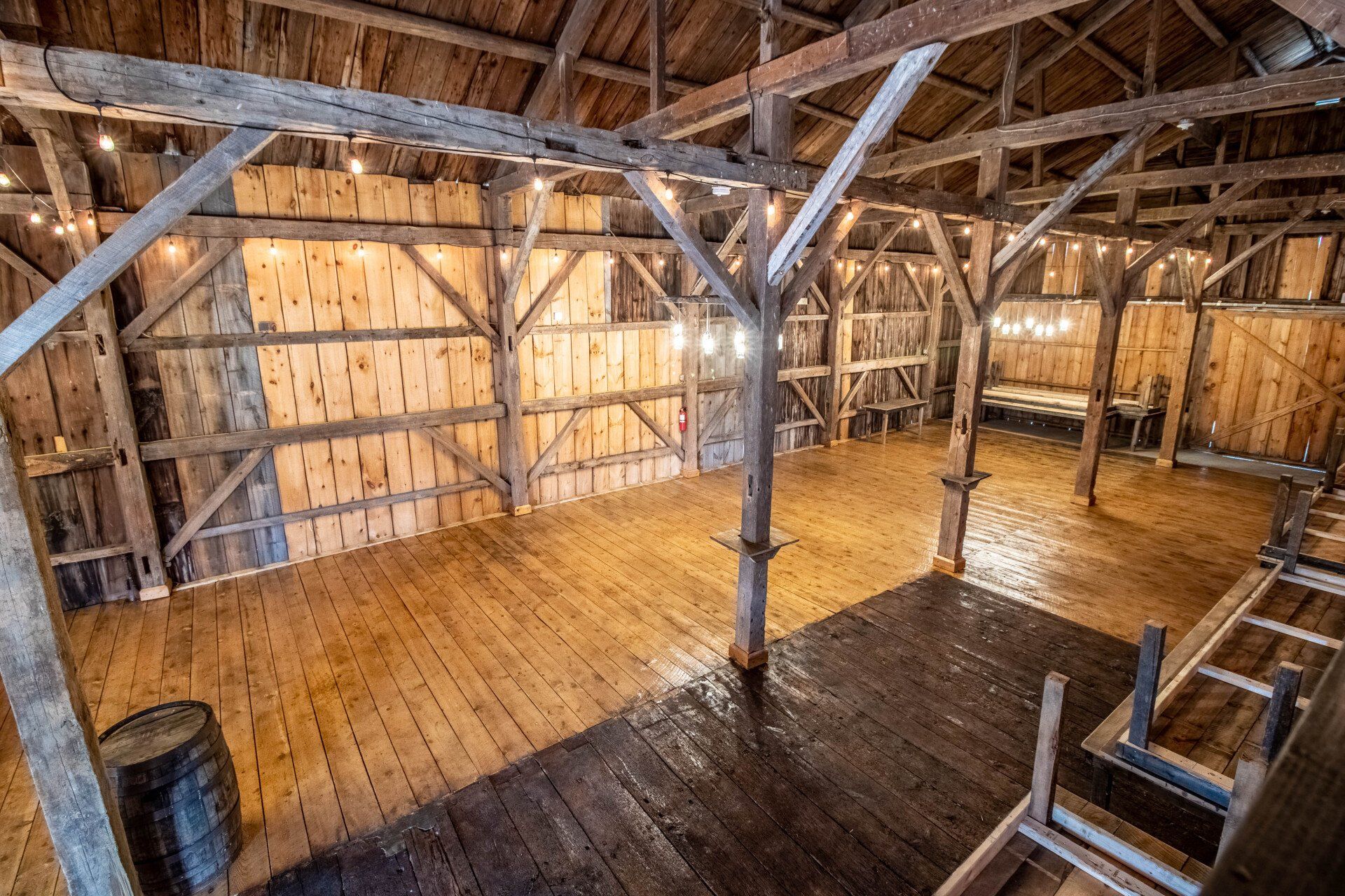Inside the barn with lights on — Dayton, ME — This Old Barn