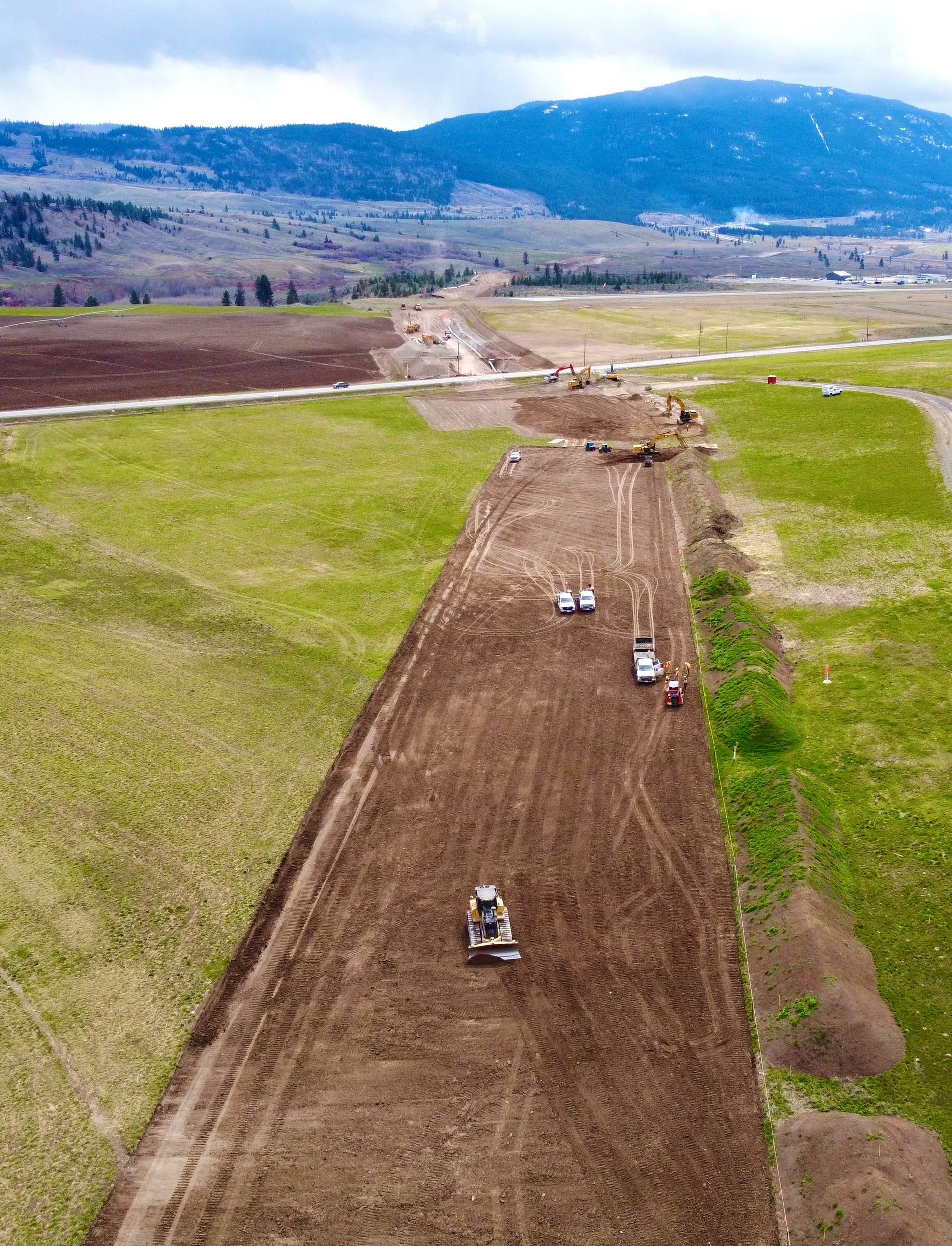 An oil rig is floating in the middle of the ocean.