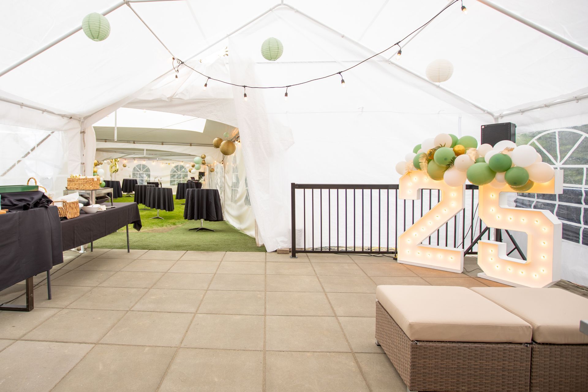 A large white tent is sitting on top of a tiled floor.