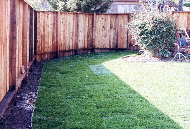 Green Grass and Wood Fence — Fairfield, CA — J S L Landscaping & Maintenance Inc.